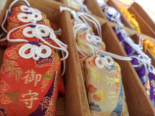 Japanese omamori charms for protection and good luck at a shrine